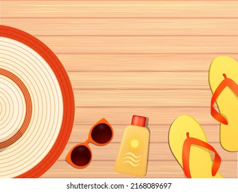 Summer holiday concept, hat, sunglasses, sun protection, flip-flops on wooden background top view