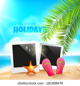 Summer holidays - background with flip flops and photoframes in the sand