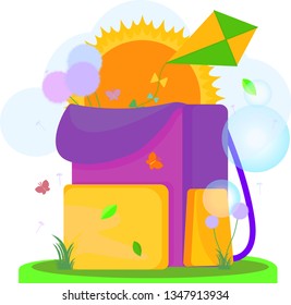 Summer holidays: school backpack on the grass