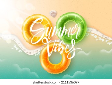 Summer holidays vector design. Summer vibes typography text in beach seashore with fruity floaters and sea shell tropical elements for relax outdoor vacation. Vector illustration.
