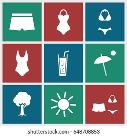 Summer icons set. set of 9 summer filled icons such as sun, soda, tree, swimsuit, umbrella, man swim wear