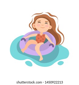Summer kids activity - little girl sitting in inflatable mattress in swimming pool, sea or ocean. Summer swimming pool activity, holiday summer vacation. Girl in in inflatable mattress