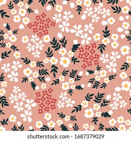 Summer meadow. Trendy fabric pattern with small flowers. Botanical seamless print with different floral elements. Vintage textile collection.