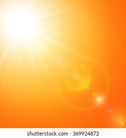 Summer natural background with sun and lens flare. 