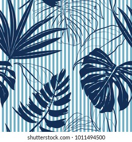 Summer Navy blue tropical forest leaves bright mood on sky blue stripe seamless pattern for fashoin fabric ,wallpaper book , card and etc 