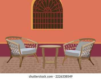 Summer outdoor cafe, coffeehouse or restaurant with rattan table and chairs standing on old street ancient Latin American city. Vector illustration in cartoon style. Colorful Horizontal background.