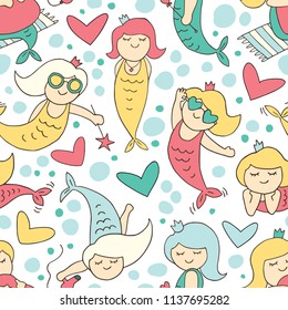 Summer pattern with cute mermaids in a cartoon style.

