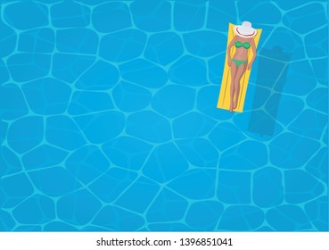 Summer relax concept. Top view on the swimming pool with sexy girl with hat