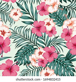 Summer repeat illustration in jungle of exotic hibiscus flowers and fern, palm leaves. Seamless vector tropical pattern on white background. Beach design wallpaper.