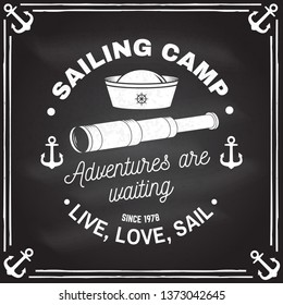 Summer sailing camp badge. Vector on the chalkboard. Concept for shirt, print, stamp or tee. Vintage typography design with anchor, hand wheel, sailor cap and spyglass silhouette. Live, love, sail.