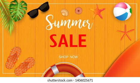 Summer sale banner with beach elements on wooden texture