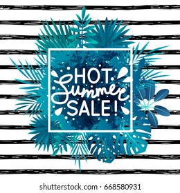 Summer sale message on tropical leaves background
