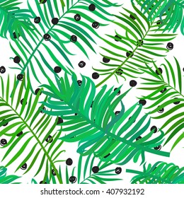 Summer seamless background with green palm leaves on polka dot background. Tropical trendy seamless pattern with exotic palm leaves. Textile pattern.