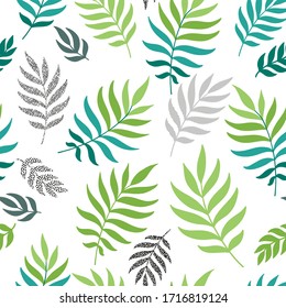 Summer seamless leaves pattern with leaves on a white background. Vector design. Floral background. Summer colorful textile design.