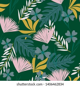 Summer seamless pattern with bright tropical plants and flowers on a dark green background. Vector design. Jungle print. Printing and textiles.