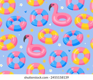 Summer seamless pattern. Cute tropical pattern. Inflatable rings, blue background. Flamingo. Relaxation, vacation. 