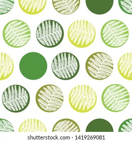 Summer seamless pattern with polka dots and palm leaves. The motif of the fern.