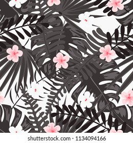 Summer seamless pattern with tropical flowers and leaves.