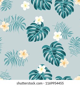 Summer seamless pattern with tropical flowers and leaves.