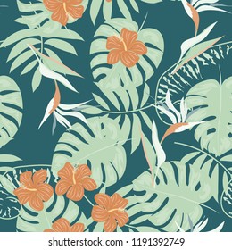 Summer seamless pattern with tropical flowers and leaves.