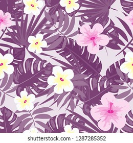 Summer seamless pattern with tropical flowers and leaves.