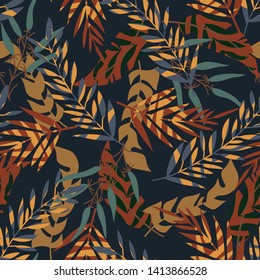 Summer seamless pattern with tropical leaves and plants on a dark blue background. Vector design. Jungle print. Textiles and printing.