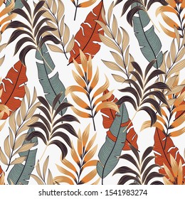 Summer seamless tropical pattern with beautiful leaves and plants on a light background. 
Summer colorful hawaiian seamless pattern with tropical plants. Beautiful print with hand drawn exotic.