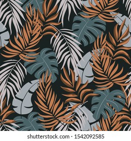 Summer seamless tropical pattern with beautiful leaves and plants on dark background. Exotic tropics. Summer. Seamless exotic pattern with tropical plants.