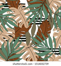 Summer seamless tropical pattern with beige and green leaves and plants on a delicate background. 
Beautiful print with hand drawn exotic plants. Tropic leaves in bright colors. Exotic wallpaper.