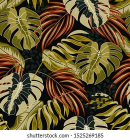 Summer seamless tropical pattern with bright red and yellow leaves and plants on a black background. Colorful stylish floral. Hawaiian style.  Exotic wallpaper. Exotic jungle wallpaper.