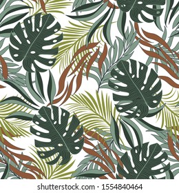 Summer seamless tropical pattern with bright green and red plants and leaves on a light background.  Summer colorful Hawaiian seamless pattern with tropical plants. Exotic tropics. Summer.