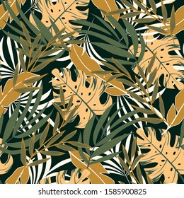 Summer seamless tropical pattern with bright yellow and green plants and leaves on a black background. Summer colorful hawaiian seamless pattern with tropical plants. 