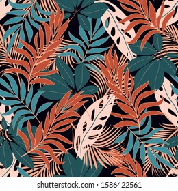 Summer seamless tropical pattern with bright red and blue plants and leaves on dark background. Beautiful seamless vector floral pattern. Modern abstract design for fabric, paper, interior decor.