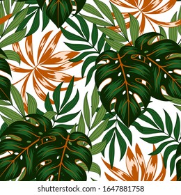 Summer seamless tropical pattern with bright green and orange leaves and plants on a delicate background. 
Seamless exotic pattern with tropical plants. Tropic leaves in bright colors.