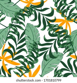 Summer seamless tropical pattern with bright plants and flowers on a white background. Seamless pattern with colorful leaves and plants. Beautiful seamless vector floral pattern.