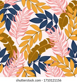 Summer seamless tropical pattern with bright plants and leaves on a white background. Seamless exotic pattern with tropical plants. Tropic leaves in bright colors.