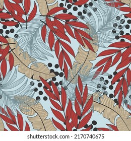 Summer seamless tropical pattern with bright plants and leaves on a blue background. Seamless pattern with colorful leaves and plants. Hawaiian style.