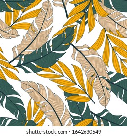 Summer seamless tropical pattern with colorful plants and leaves on a light background.Vector design. 
Seamless pattern with colorful leaves and plants. 
Exotic jungle wallpaper.