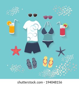 Summer seaside holiday vector illustration with a conceptual arrangement of a female swimsuit, male clothing, sunglasses, slip slops, cocktails and starfish on a blue background depicting the sea