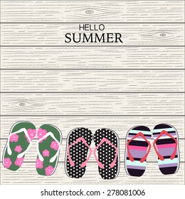 Summer slipper with wood linear background 