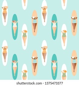 Summer sport activities illustration. Surfer girls sunbathing on surf long boards seamless pattern. Vector surfing surfers background.