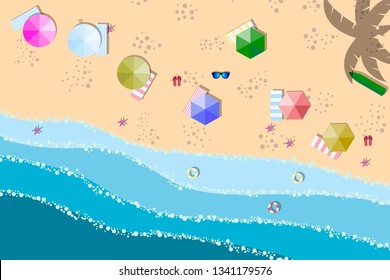 Summer sunny beach with umbrellas. Sea waves Top view. Travel, vacation, holidays concept. 