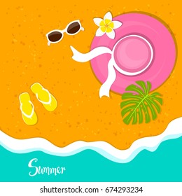 summer time beach vacation holidays background with woman hat, sunglasses, plumeria flower, flip flops and monstera tropical leaf on sand