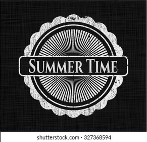 Summer Time chalkboard emblem written on a blackboard