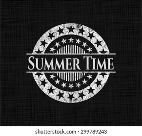 Summer Time written on a blackboard 