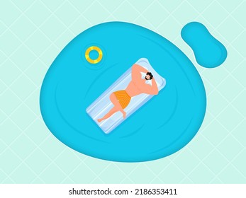 Summer time, young man relaxing on a pool. Summer travelling concept. 