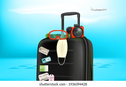Concepto de viajes de verano con equipaje, cámara, máscara protectora. Verano 2021