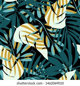 Summer trend seamless pattern with bright tropical leaves and plants on a black background. Vector design. Jungle print. Floral background. Printing and textiles. Exotic tropics. Summer design.