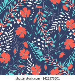 Summer trend seamless pattern with tropical leaves and flowers on a dark background. Vector design. Jung print. Floral background. Printing and textiles.