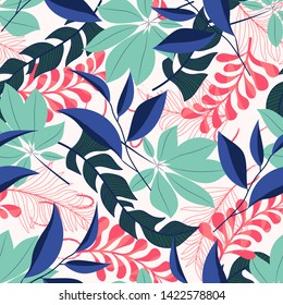 Summer trend seamless pattern with tropical leaves and plants on pastel background. Vector design. Jung print. Floral background. Printing and textiles.